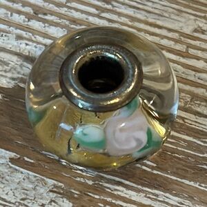 TROLLBEADS Murano clear glass bead gold inset pink flowers green leaves ss core